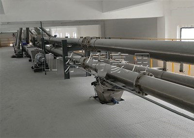 橡膠助劑管鏈輸送機的運行原理